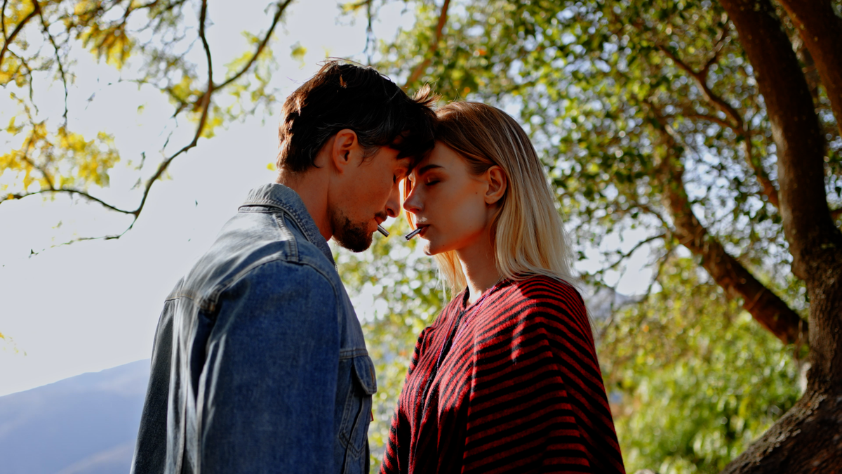 A couple using the Lovetuner to tune into the 528 Hz Frequency