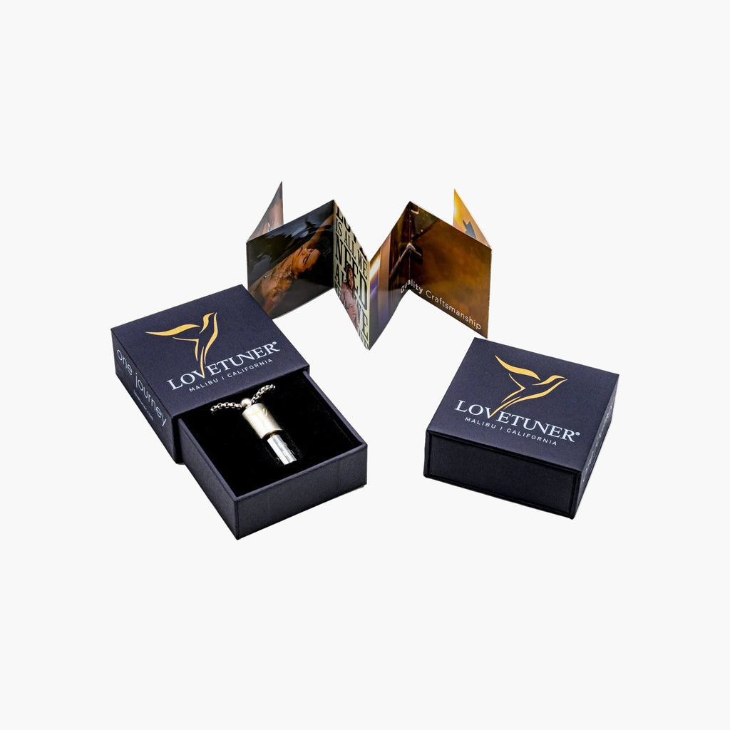 Lovetuner bronze 528Hz breathing necklace in signature gift box with brand leaflet
