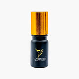 Lovetuner Egyptian Pharaoh Oil 528 Hz essence in a black bottle with gold cap and gold Lovetuner logo