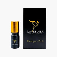 Lovetuner Egyptian Pharaoh Oil 528 Hz healing essence bottle with gold cap beside its black gift box