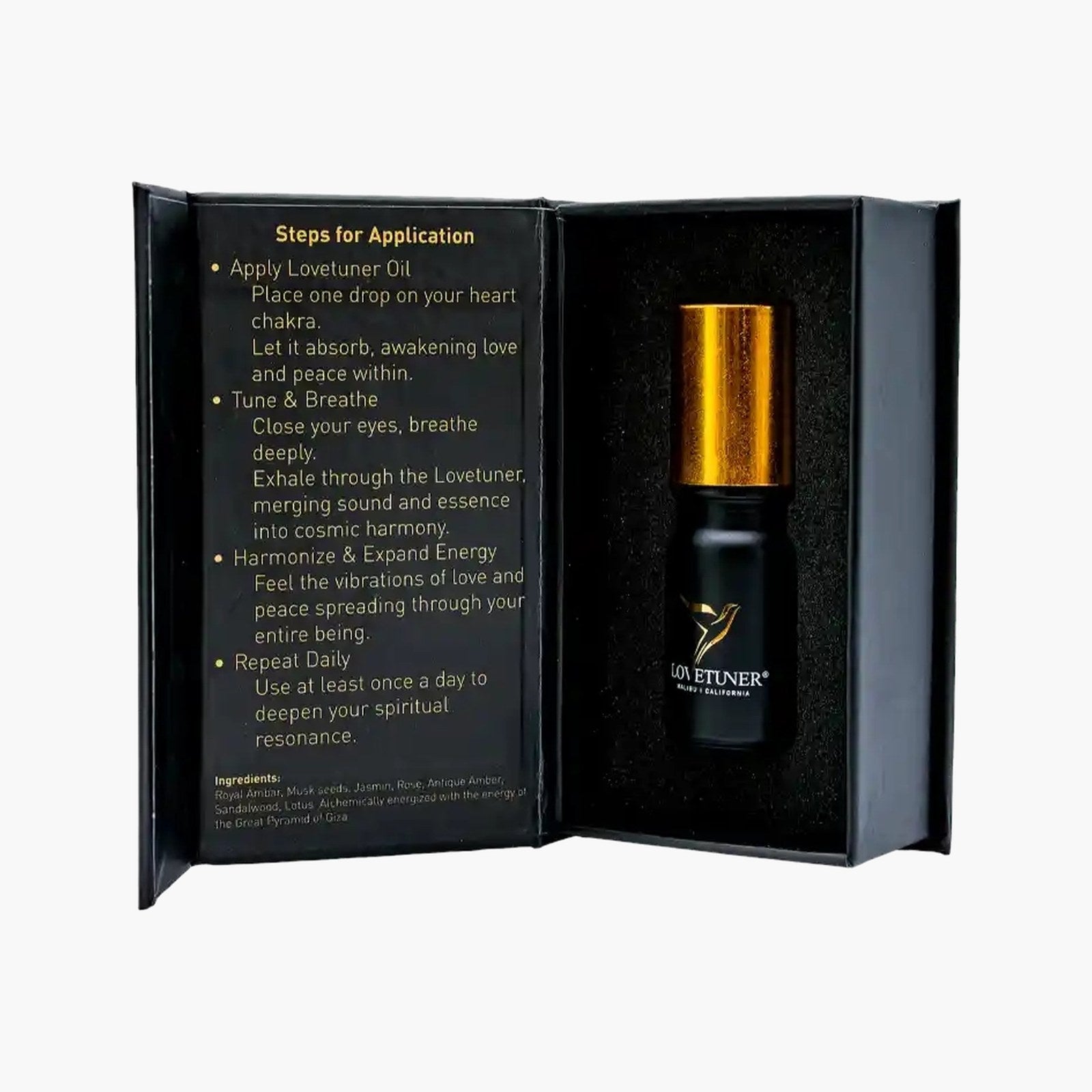 Open Lovetuner gift box with the Egyptian Pharaoh Oil bottle and printed steps for application