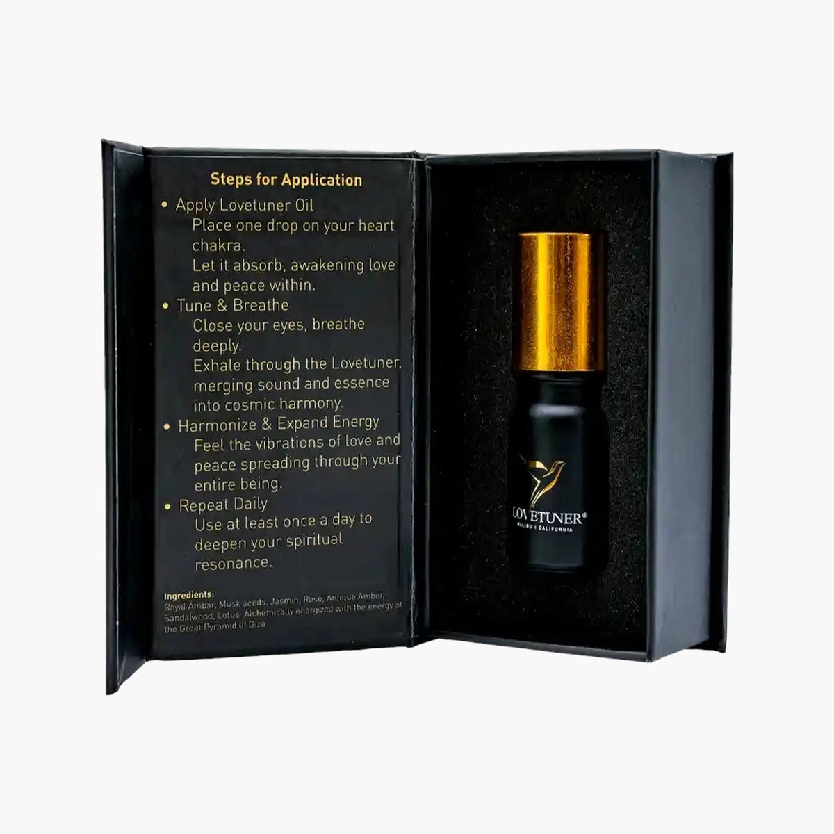 Open Lovetuner gift box with the Egyptian Pharaoh Oil bottle and printed steps for application