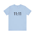 Carica l'immagine nel visualizzatore della galleria, Light blue t-shirt with '11:11' print on a white background
