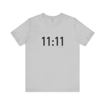 White t-shirt with '11:11' print on a white background