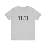 White t-shirt with '11:11' print on a white background