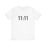 White t-shirt with '11:11' printed on a white background