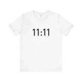 White t-shirt with '11:11' printed on a white background
