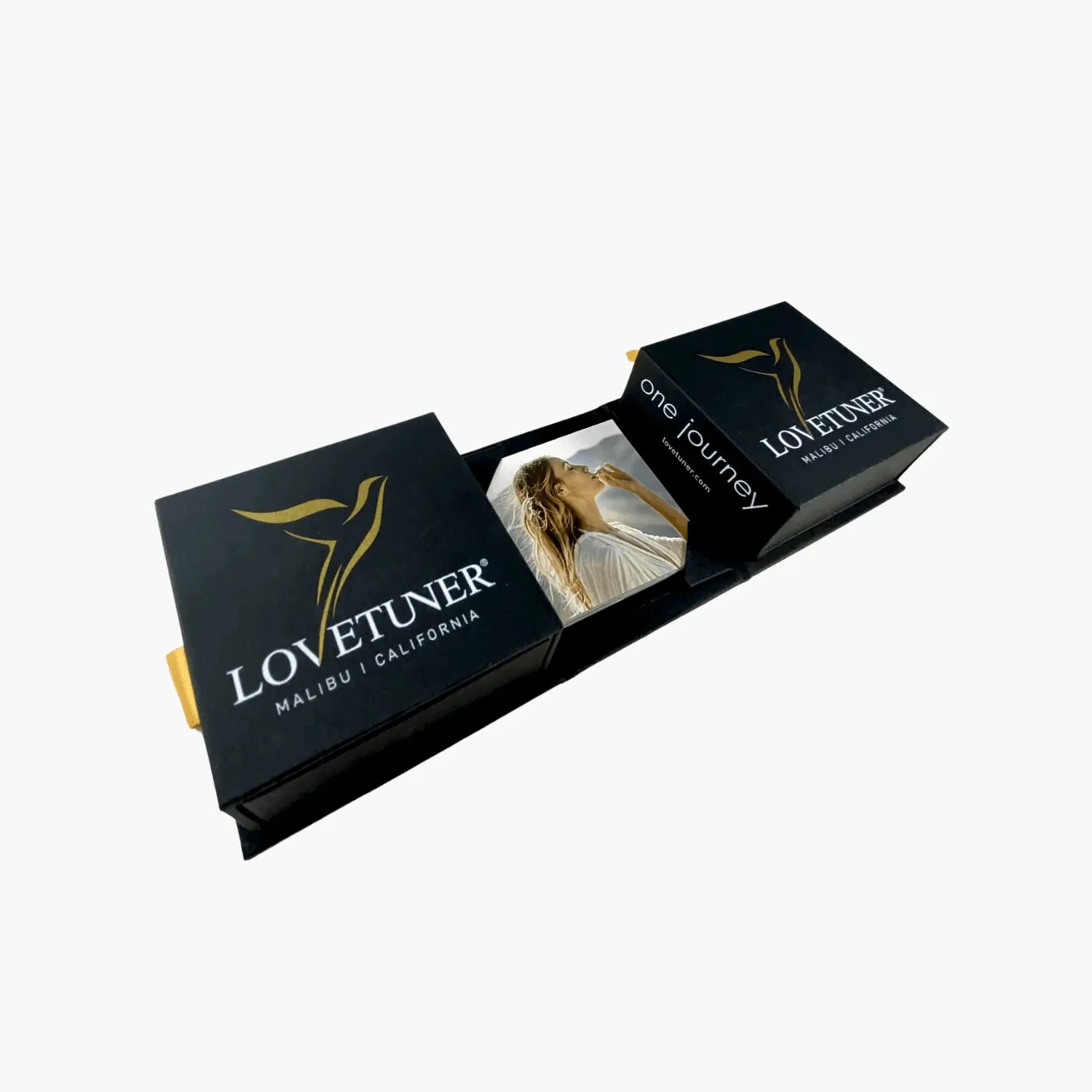 Lovetuner product packaging with a woman's silhouette on a white background