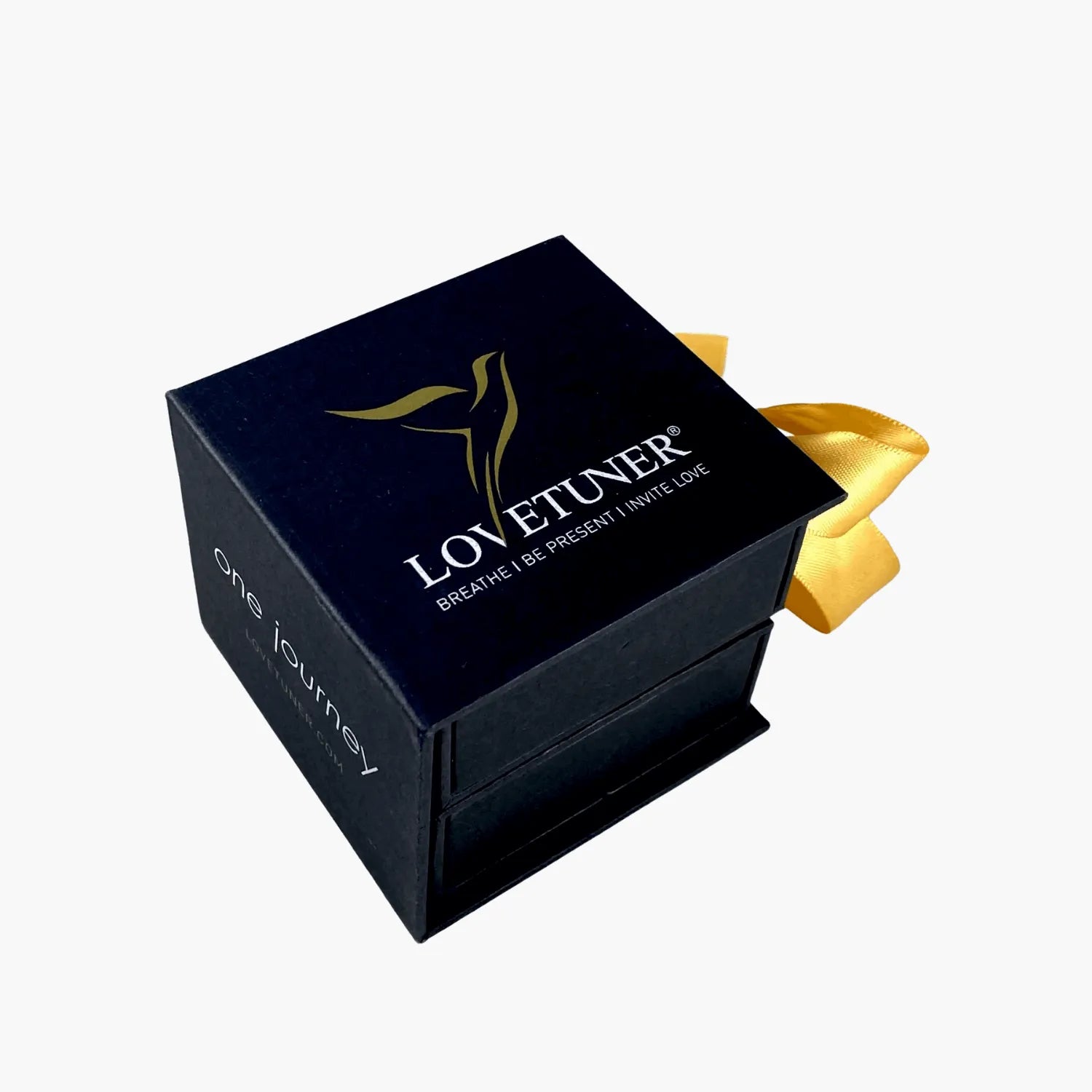 Black packaging with gold ribbon and 'Lovetuner' branding on a white background