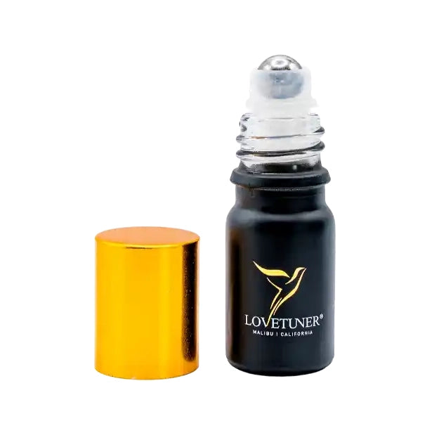 Roll-on bottle with gold cap and black body featuring Lovetuner logo on a white background