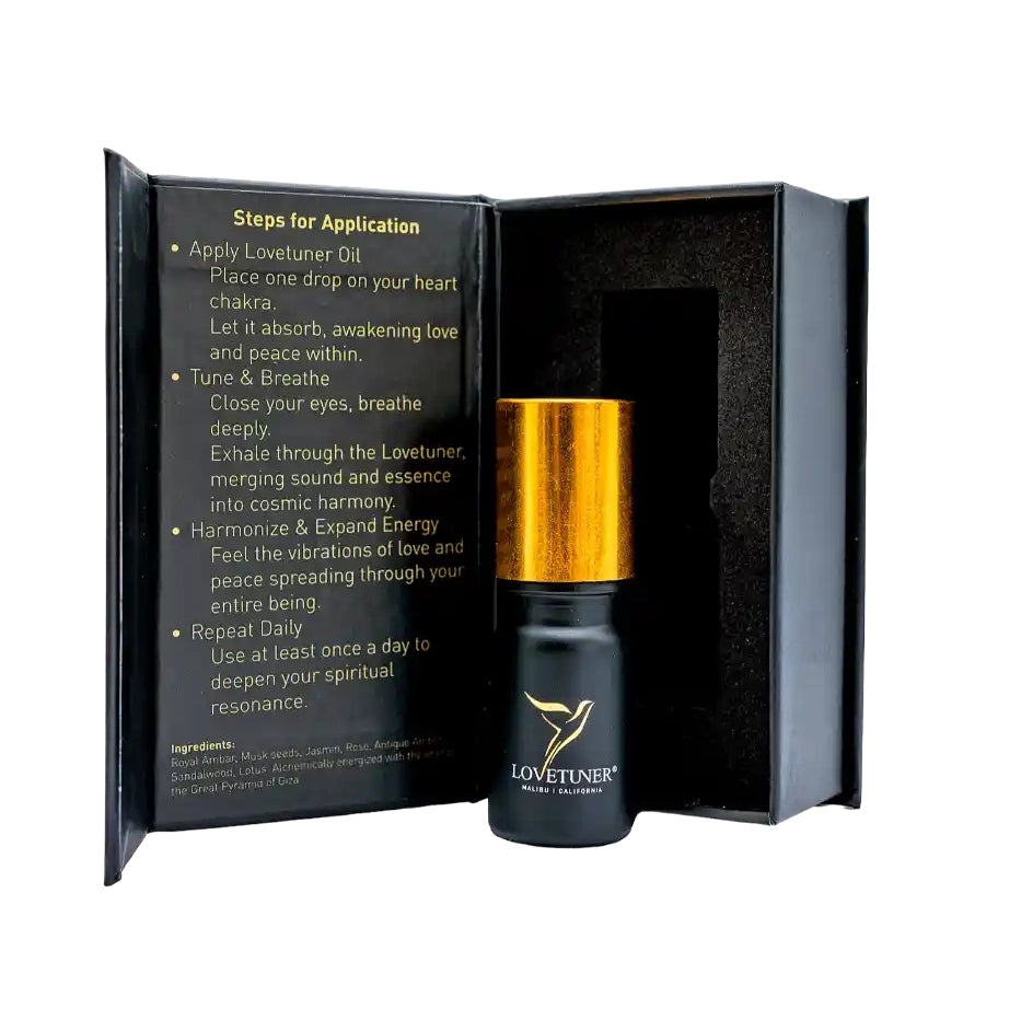 Lovetuner oil bottle with application instructions in a black box on a white background
