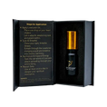 Load image into Gallery viewer, Black and gold bottle of Lovetuner oil with application instructions on a white background
