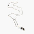 Carica l'immagine nel visualizzatore della galleria, Necklace with a white cylindrical Lovetuner with a ball chain necklace on a white background
