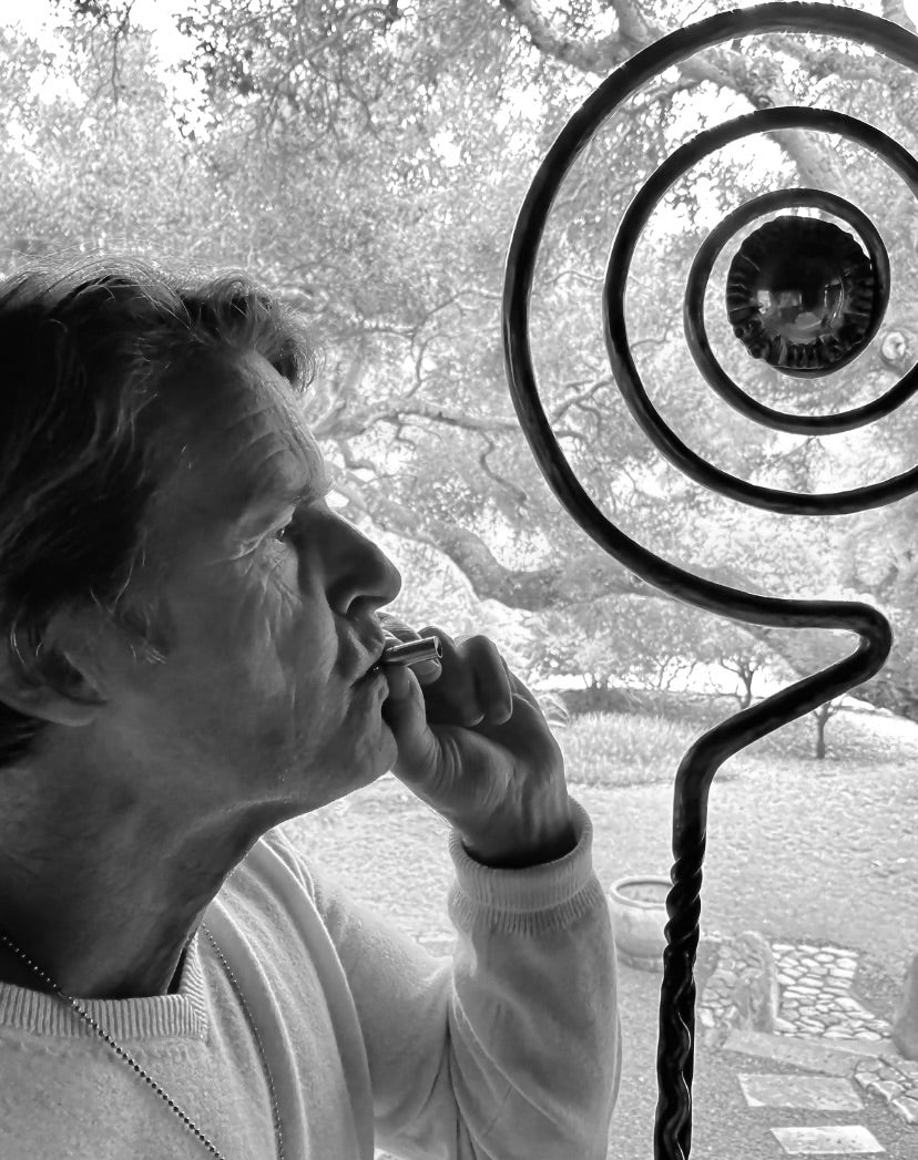 A photo of an older man using the Lovetuner